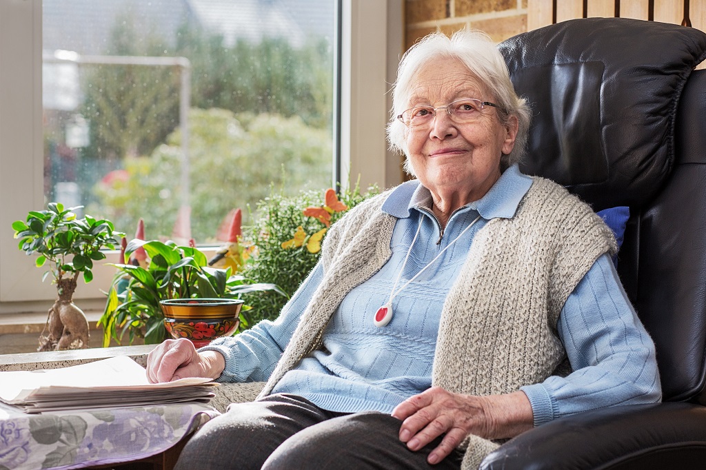 Elderly woman with emergency button